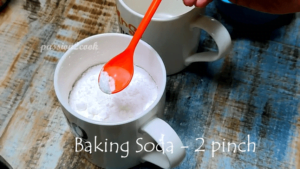 adding baking soda for vanilla mug cake in air afryer