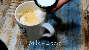 adding milk for vanilla mug cake in air afryer