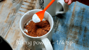 Adding baking powder to chocolate mug cake in air fryer