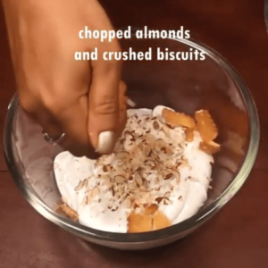 chopped almonds added to the cream