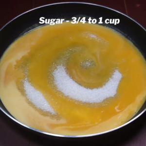 adding sugar to orange juice