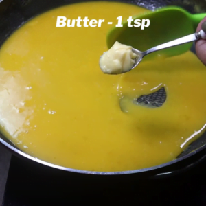 adding butter to thickening orange juice